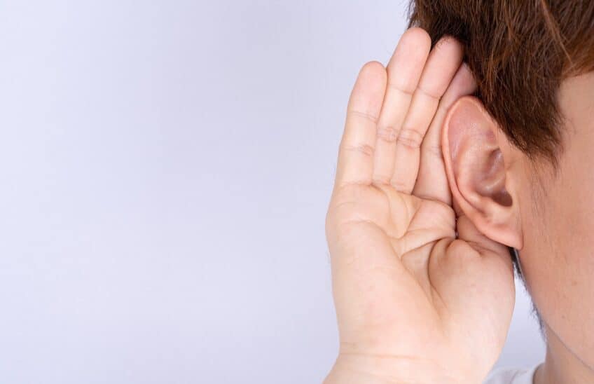 Man Hearing Loss Or Hard Of Hearing And Cupping His Hand Behind